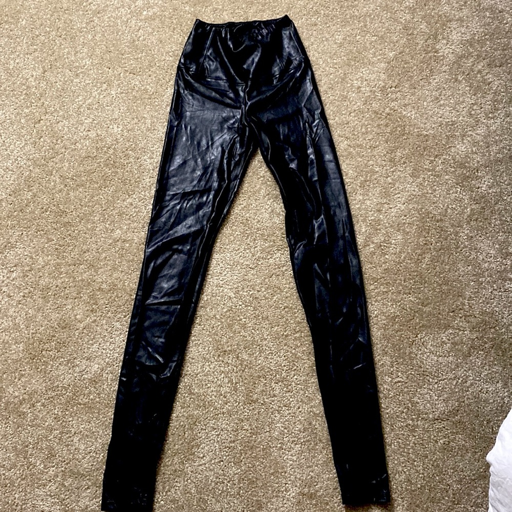 Faux leather pants. No signs of being warn looks brand new.